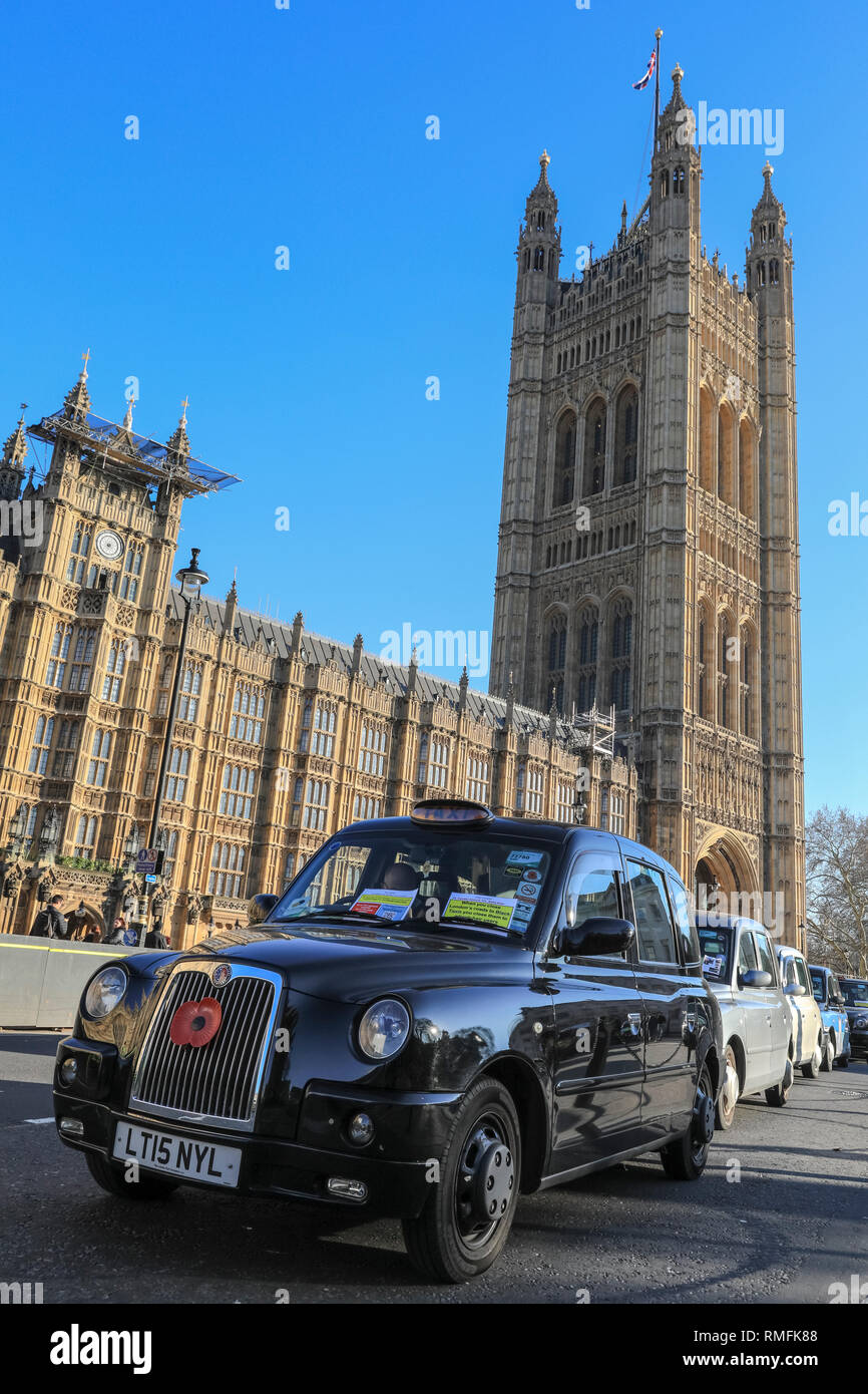 London, UK. 15th Feb 2019. Black cab drivers once again bring parts of central London to a standstill and block roads around Parliament Square and Westminster with their ongoing protest against plans to ban them from driving on roads in parts of the capital. Credit: Imageplotter News and Sports/Alamy Live News Stock Photo