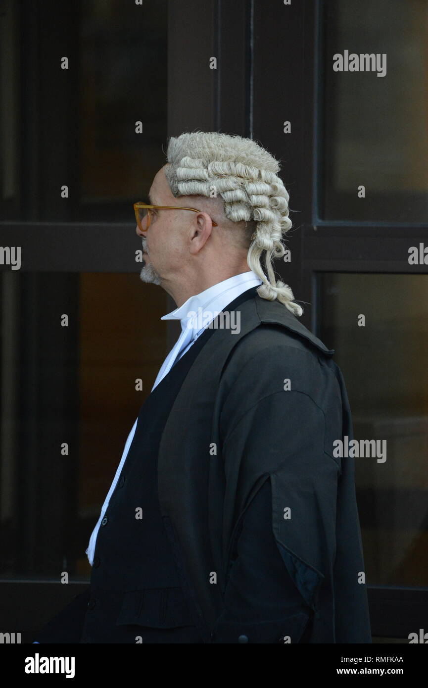 Glasgow, UK. 15th Feb, 2019. A lawyer seen outside the High Court whilst the Alesha McPhail's Murder Trial continues. Alesha's body was found in the grounds of a former hotel on 2 July last year. Not able to name the accused. It is illegal in Scotland to publish the name, address, school or any other information which could identify anyone under the age of 18 who is the accused, victim or witness in a criminal case This law applies to social media as well as to websites, newspapers and TV and radio programmes. Credit: Colin Fisher/Alamy Live News Stock Photo