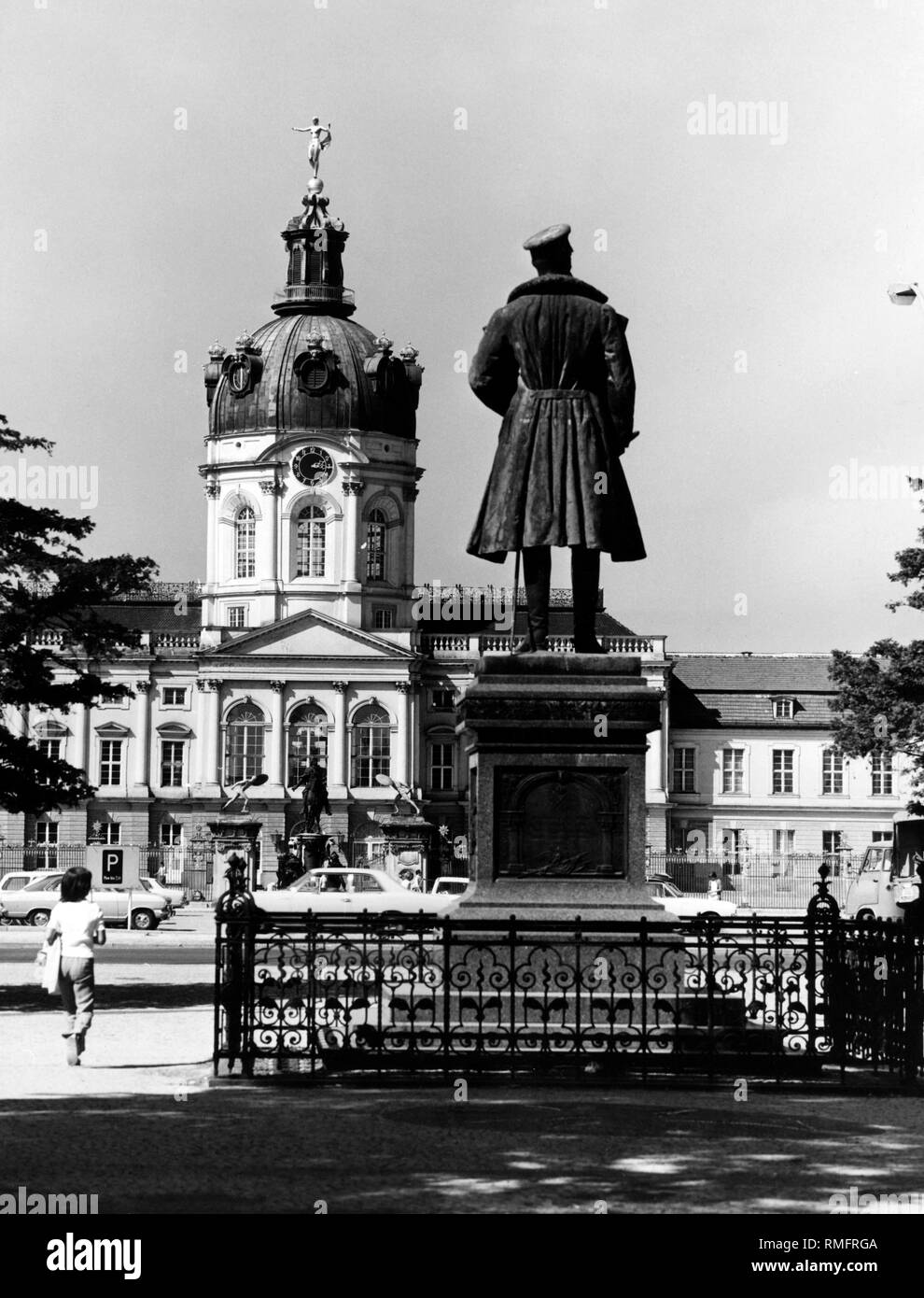 View of the portal of Charlottenburg Palace in West Berlin. In the foreground the statue of Prince Albrecht of Prussia by the sculptor Eugen Boermel. Stock Photo