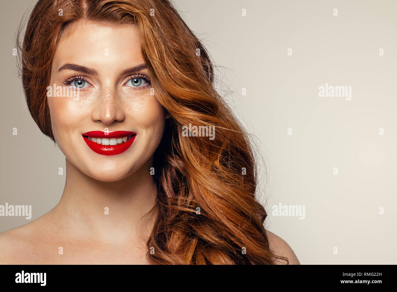 Candid woman with freckles and ginger hair. Natural redhead girl lifestyle portrait Stock Photo