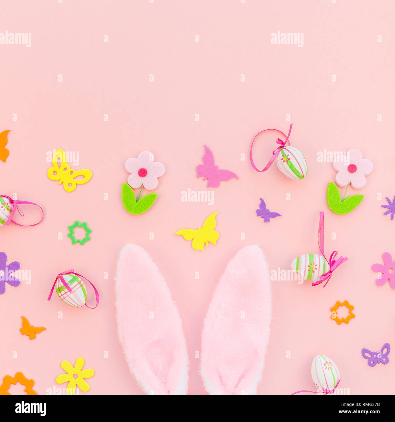 Creative Top view flat lay holiday composition Easter eggs bunny ears ...