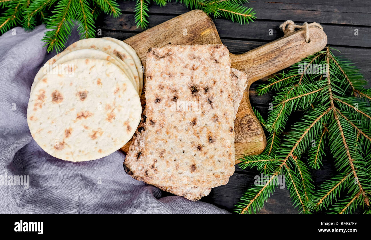 Barley flatbread original Lapland bread on the wood cutting board