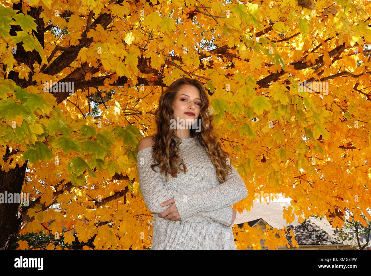 Beautiful country girl in a Fall country setting Stock Photo
