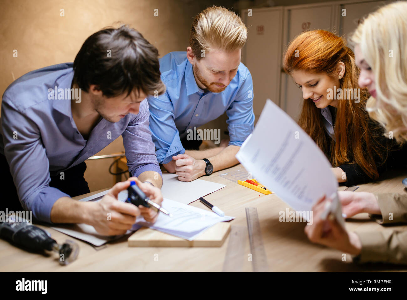 Group of creative designers brainstorming Stock Photo - Alamy