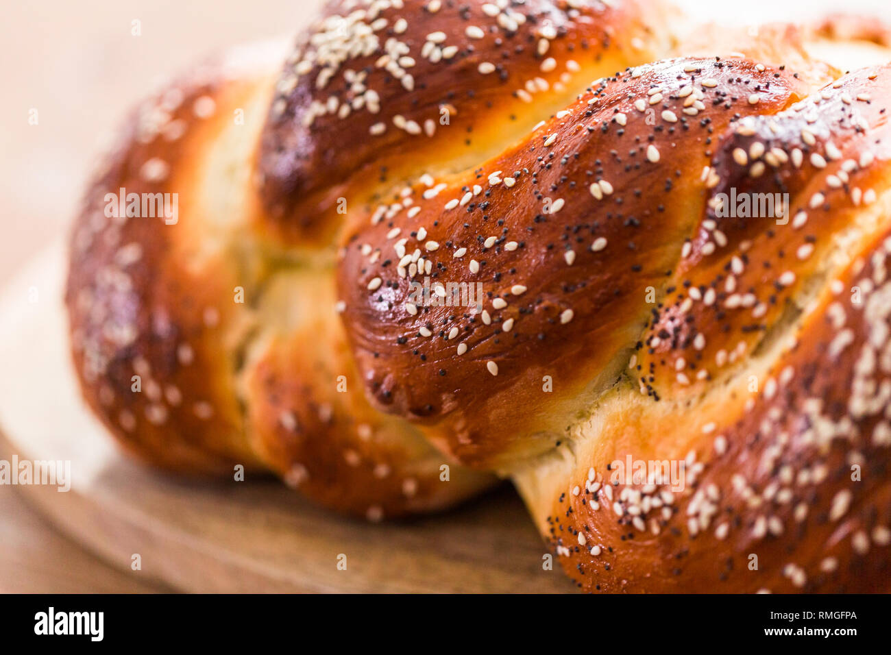 Close up of braided challah bread with sesame and poppy seeds Stock Photo Alamy