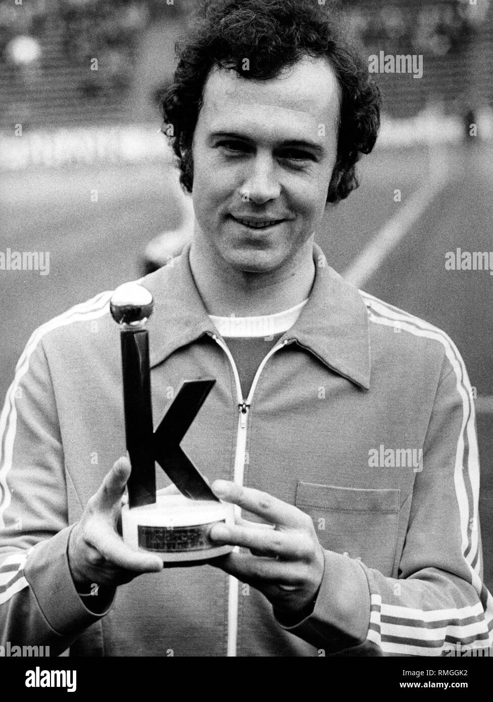 Franz Beckenbauer with the Kicker award. Stock Photo