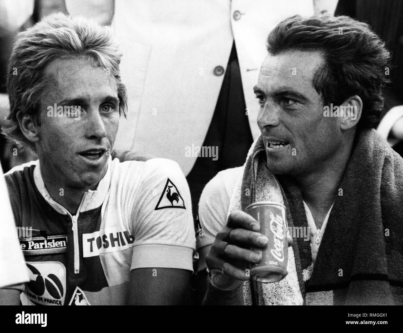 Cyclists Greg LeMond (left) and Bernard Hinault at the Tour de France. On the famous Tour 1986 Hinault led the race till the 17th stage. The yellow jersey, however, was won by his US teammate LeMond. Hinault never wore the 'maillot jaune' again, that he had worn 79 times. Stock Photo