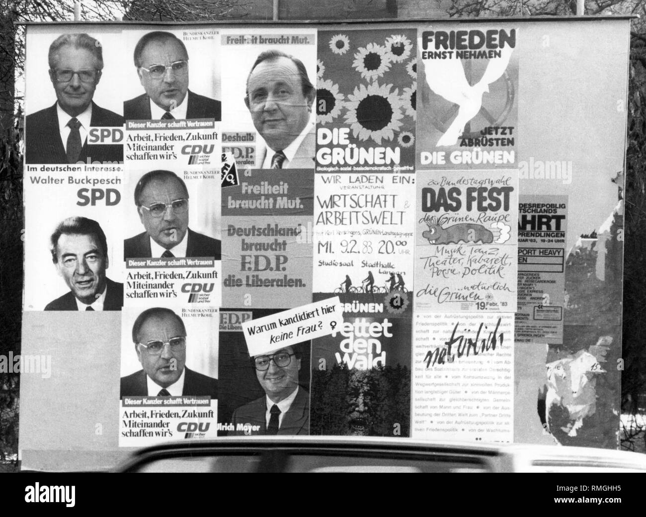 On this billboard in Langen were stick election posters of the SPD, CDU, SPD and the Greens. Someone has put a sticker on the billboard, which says, 'Why is not a woman running?'. The SPD is campaigning with its district candidate Walter Buckpesch and the slogan 'In the German interest.', The CDU with the chancellor candidate Helmut Kohl and 'This chancellor creates trust, work, peace, future, together we can do it. CDU safe, social and free', the FDP with its party leader Hans-Dietrich Genscher and the slogan 'Freedom needs courage, therefore FDP Liberals', the Greens with Stock Photo