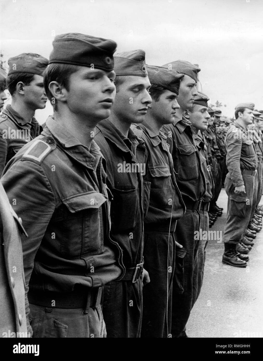 A unit of the Bundeswehr lines up for roll call in the barracks. Stock Photo