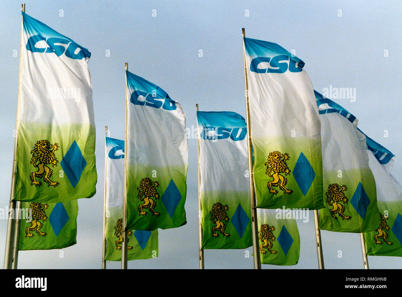 This photo shows flags of the CSU blowing at the CSU party congress in Munich. Stock Photo