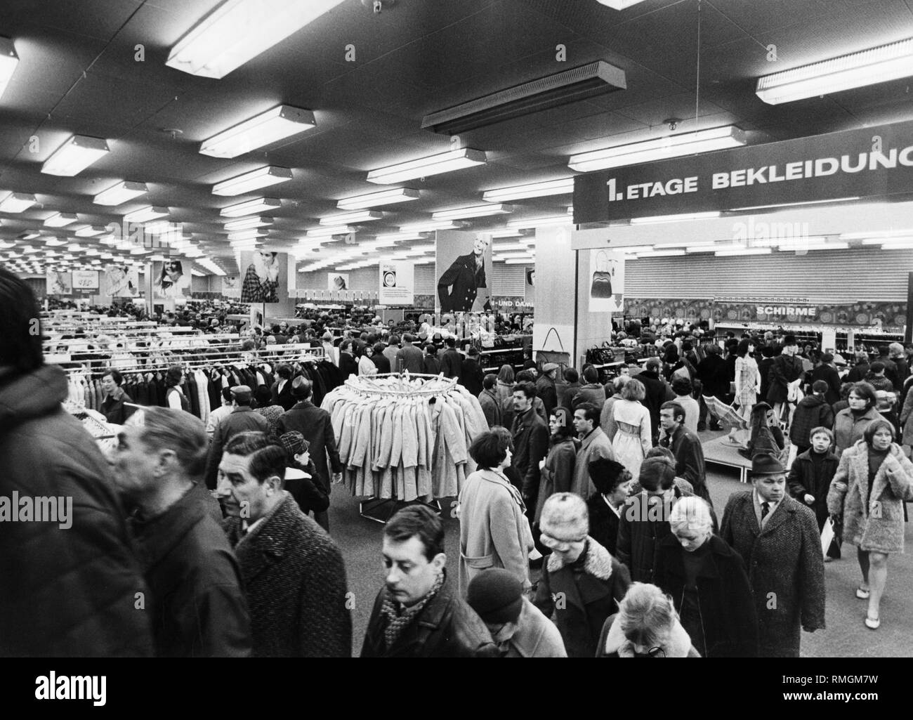 The 1st floor of the clothing section of a Centrum department store of the Handelsorganisation (?Trading Organisation?) of the GDR in East Berlin. Stock Photo