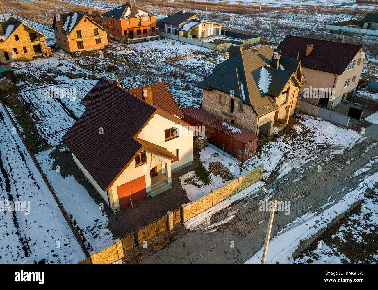 Aerial View Of New Residential House Cottage And Attached Garage