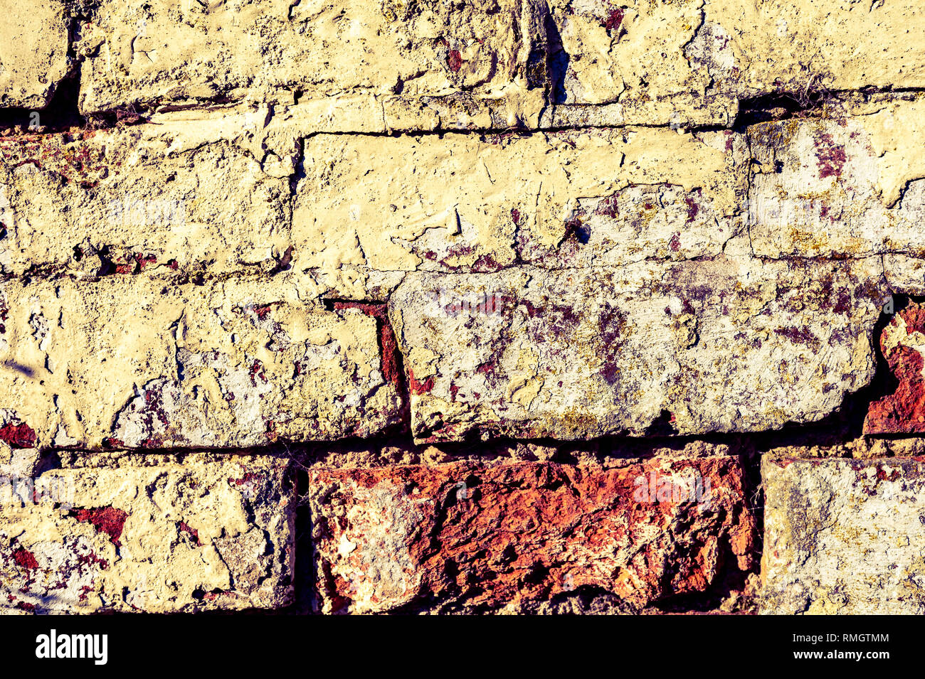Picture of Brick wall texture showing weathered hi-res stock photography and ...