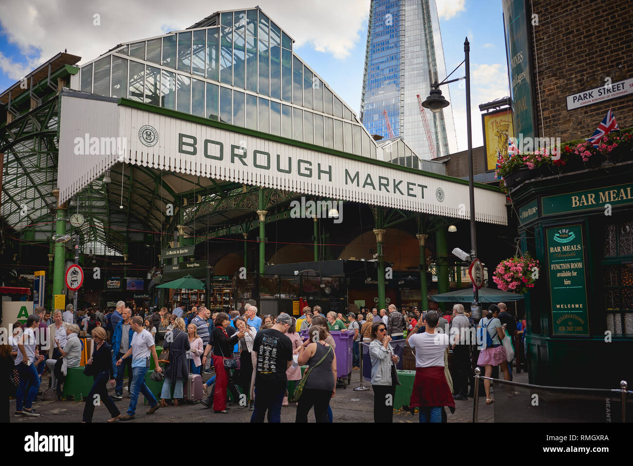 London, UK - June, 2018. Tourists and local eating and shopping in ...