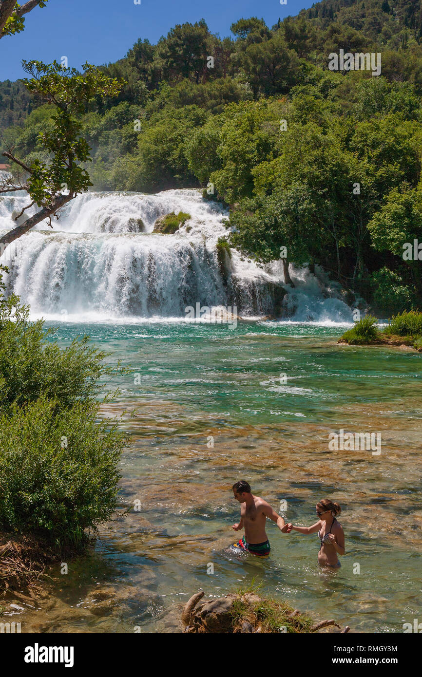 Swimming at Skradinski buk: the last waterfall on the Krka River, Krka National Park, Croatia Stock Photo