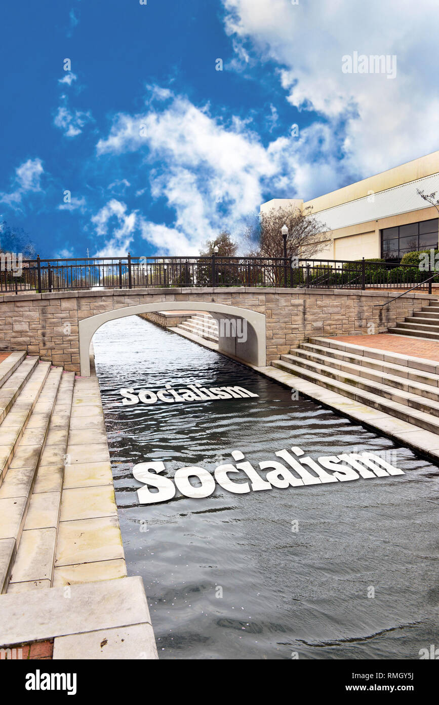 Socialism going down the river and floating. Stock Photo