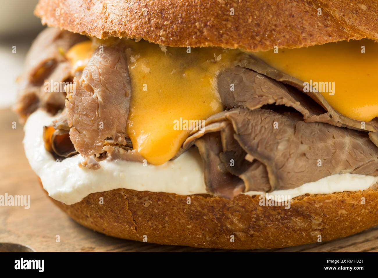 Homemade Roast Beef and Cheddar Sandwich with Curly Fries Stock Photo