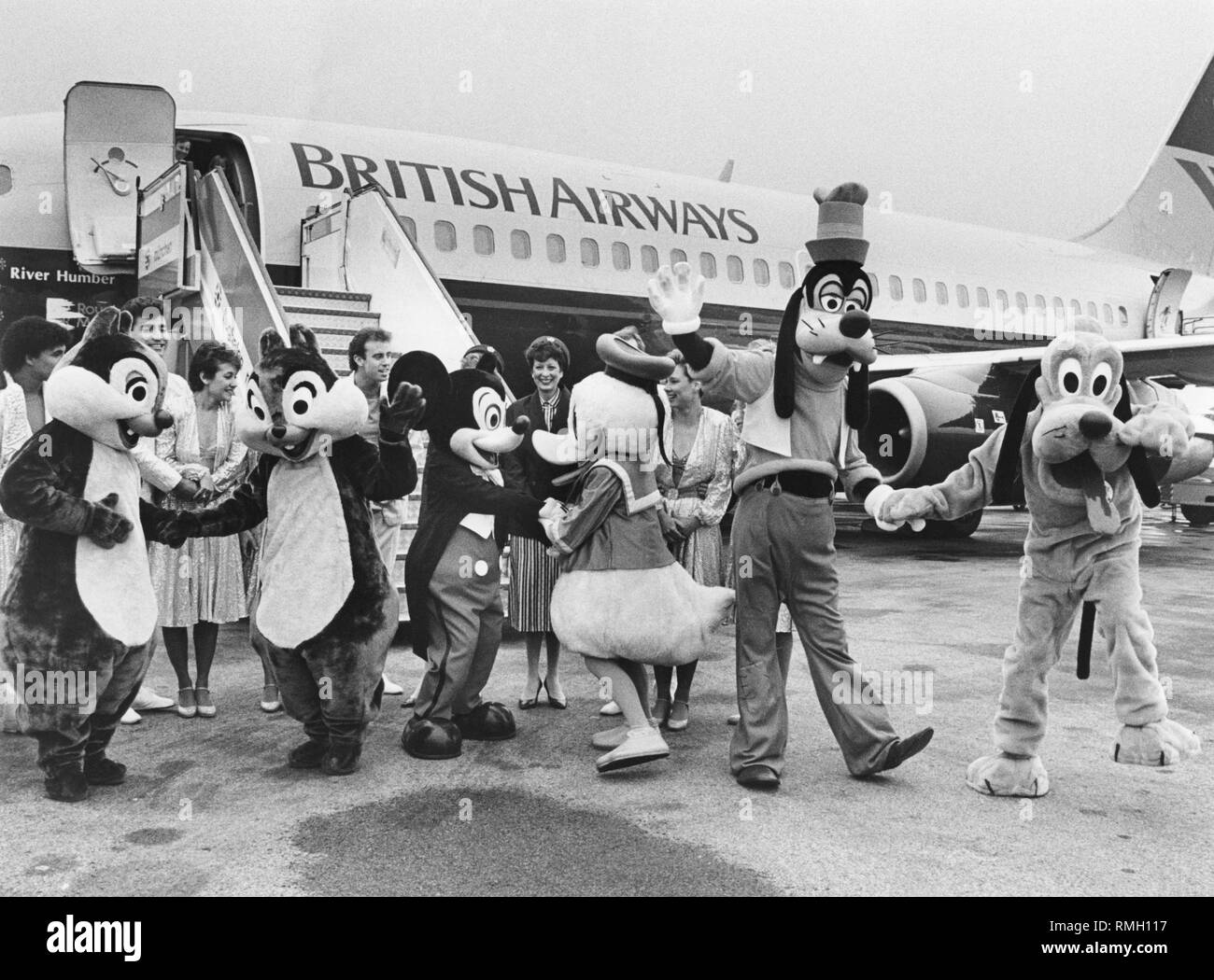 The British airline 'British Airways' advertises its North American connections with the Disney characters Chip and Dale, Mickey Mouse, Donald Duck, Goofy and Pluto. The Boeing 737 G-BDGC 'River Humber' stops in Munich, Frankfurt, Dusseldorf and Hamburg. Stock Photo