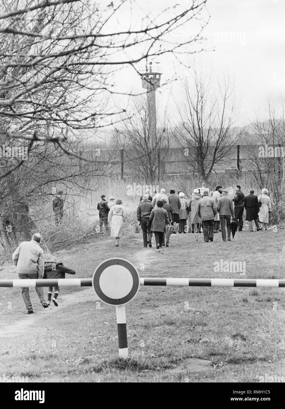 People in front of the border with the GDR near Ratzeburg. Stock Photo