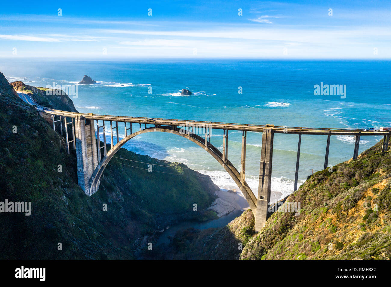 Aerial Bixby Bridge (Rocky Creek Bridge) and Pacific Coast Highway near Big Sur in California, USA America. Drone Shot Stock Photo