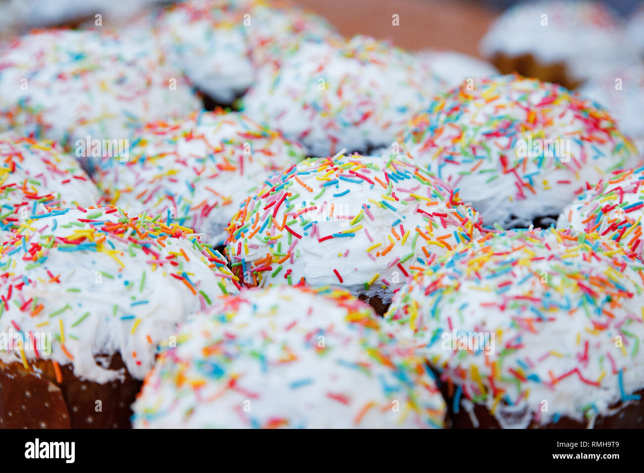 lot Easter cakes decorated with multicolored dusting Stock Photo