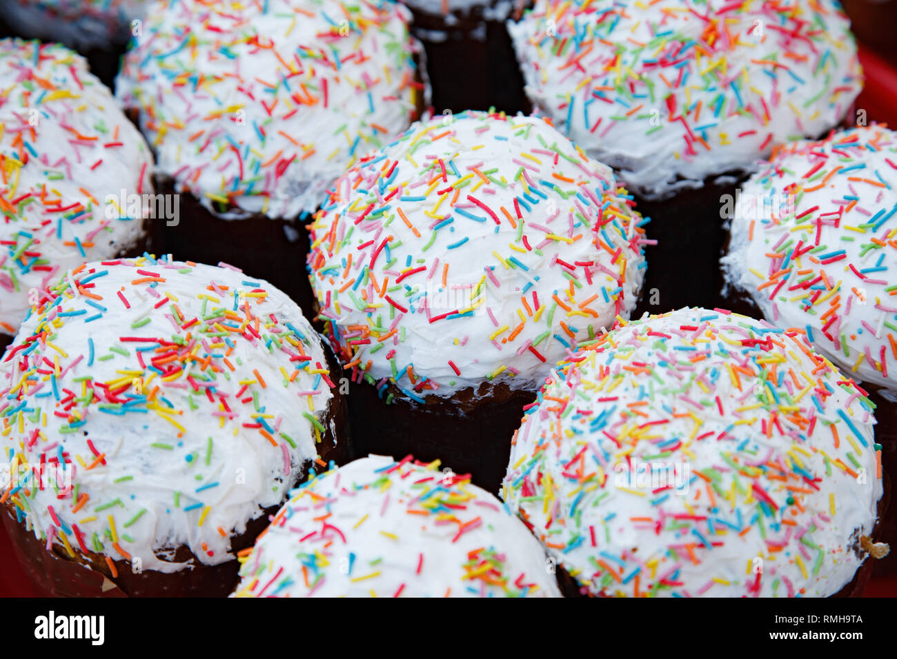 lot Easter cakes decorated with multicolored dusting Stock Photo