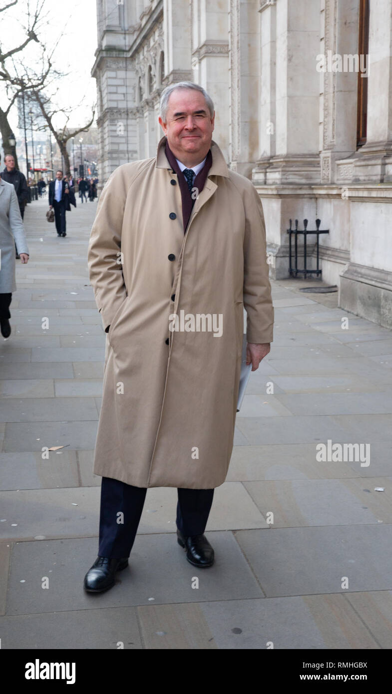 Attorney General, Geoffrey Cox, walks along Whitehall on the way to Downing Street. Stock Photo