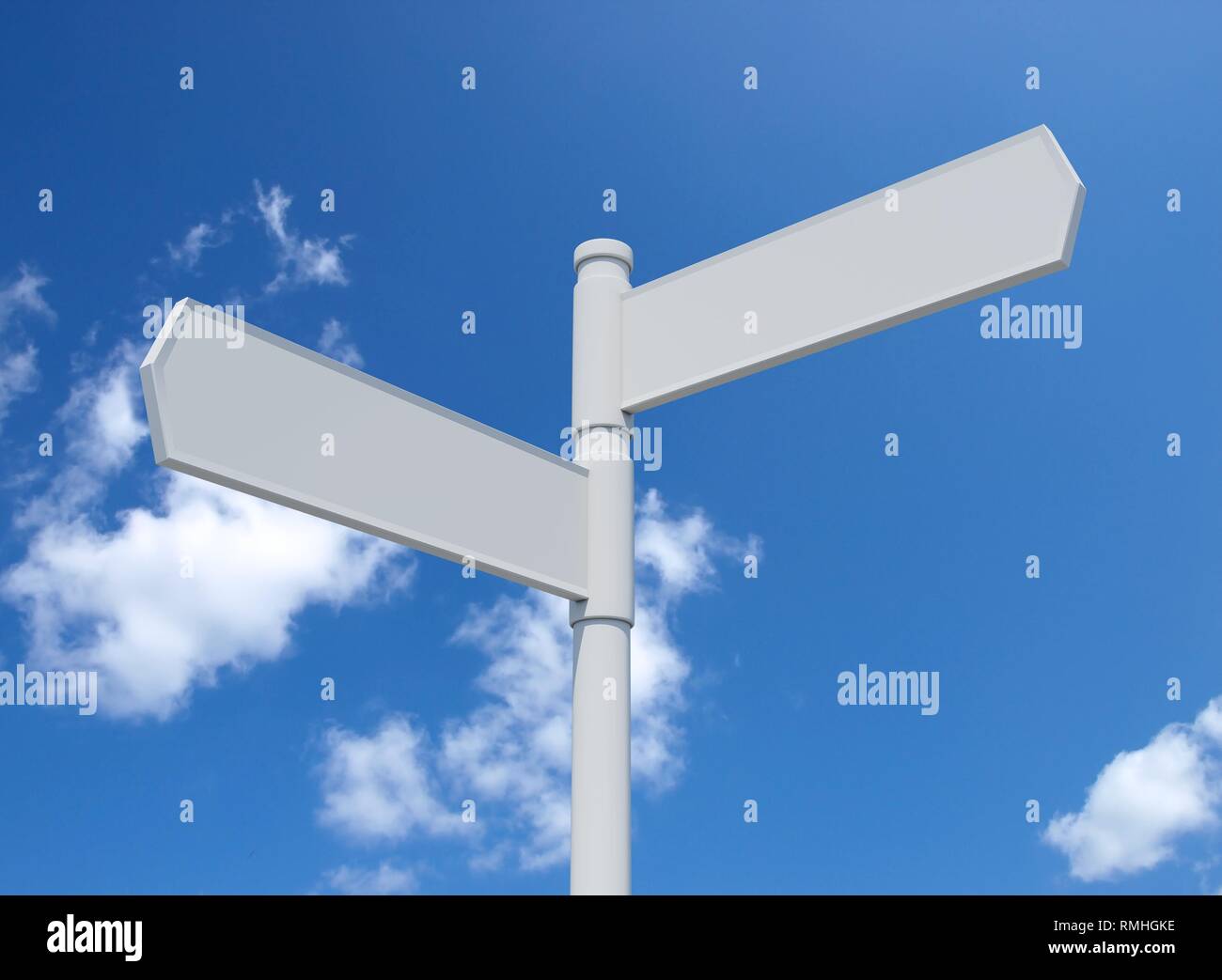 White blank signpost isolated on blue sky. Stock Photo
