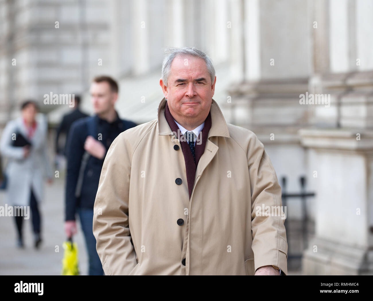 Attorney General, Geoffrey Cox, walks along Whitehall on the way to Downing Street. Stock Photo