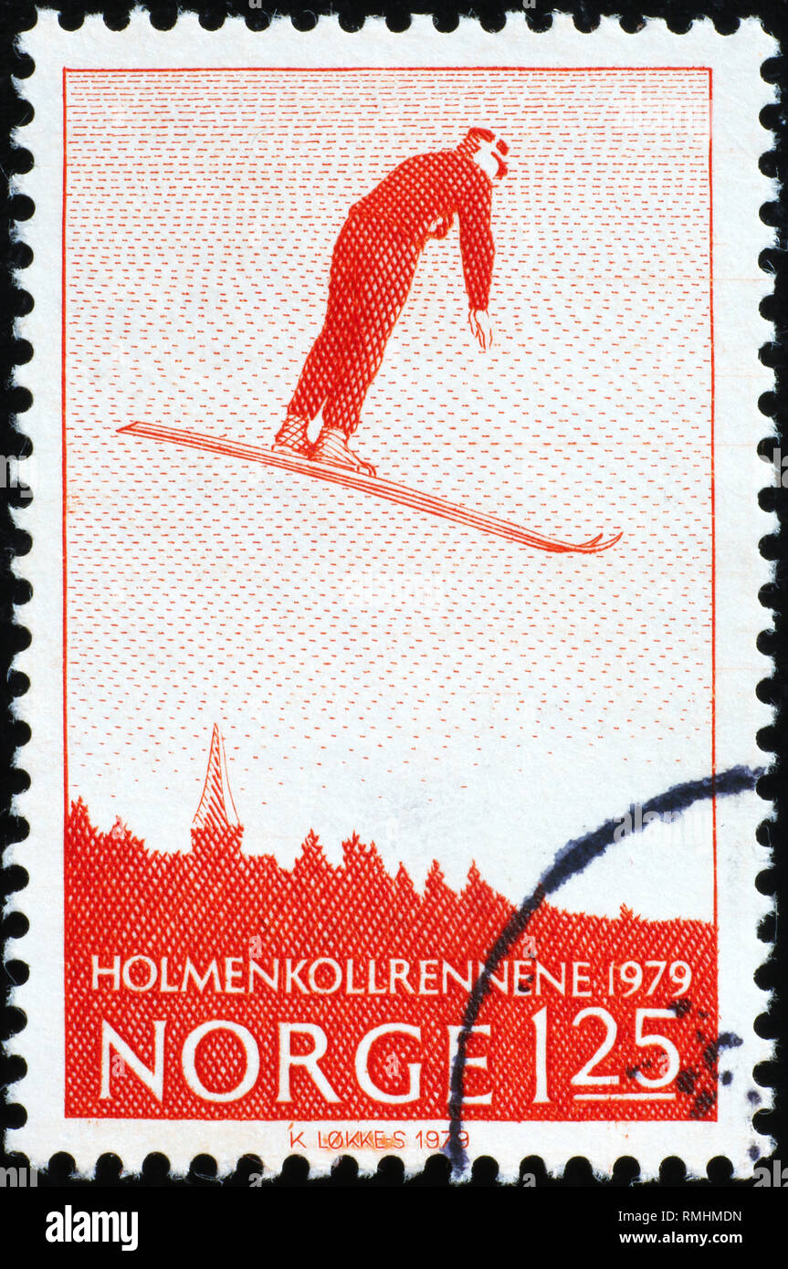 Ski jumper on vintage norwegian postage stamp Stock Photo