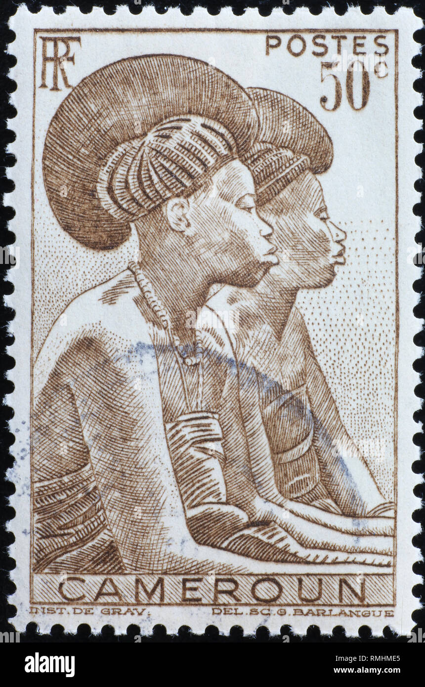 Two black women on stamp of Cameroon Stock Photo