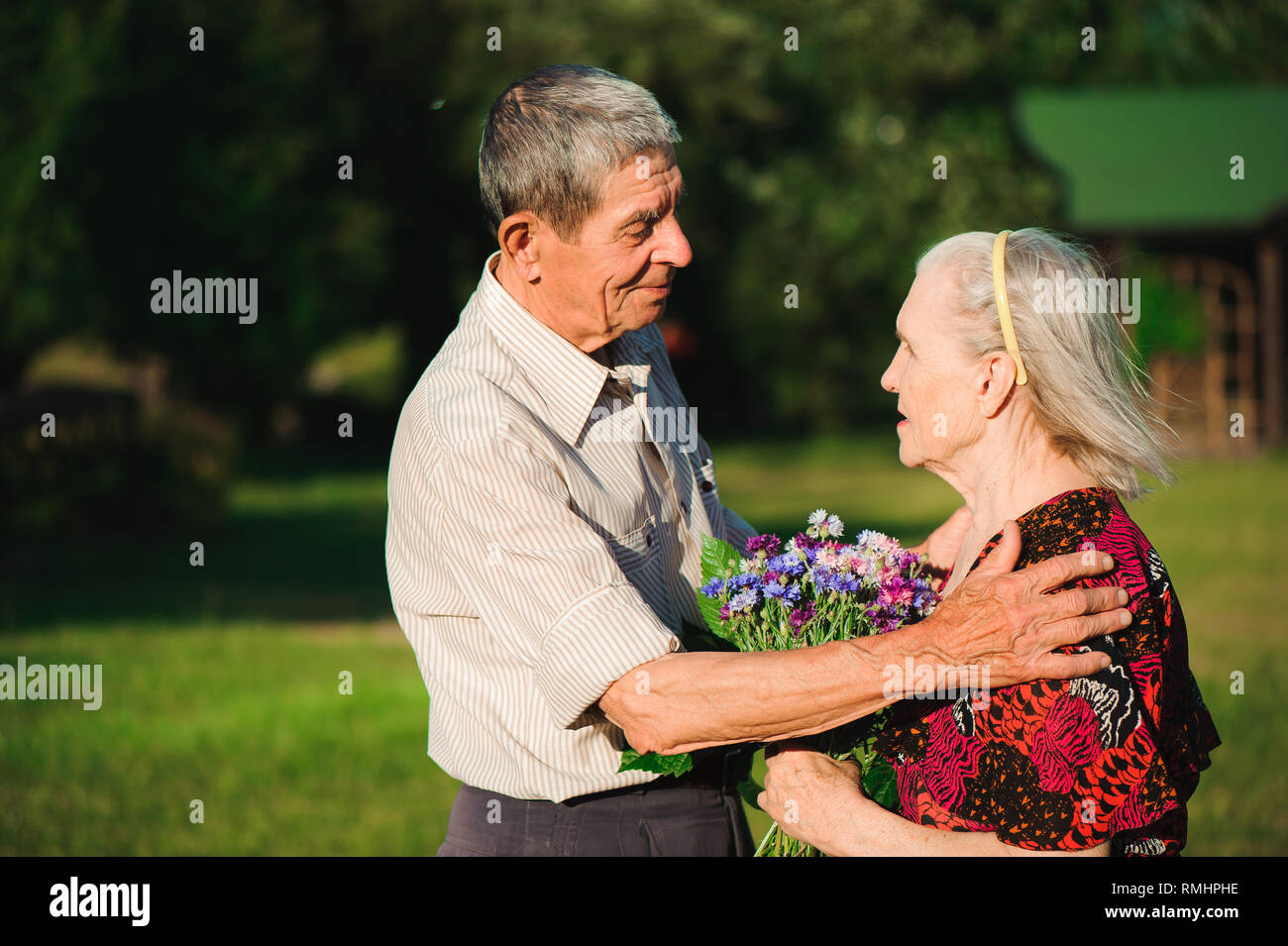 Happy elderly couple at nature. Happy old people Stock Photo