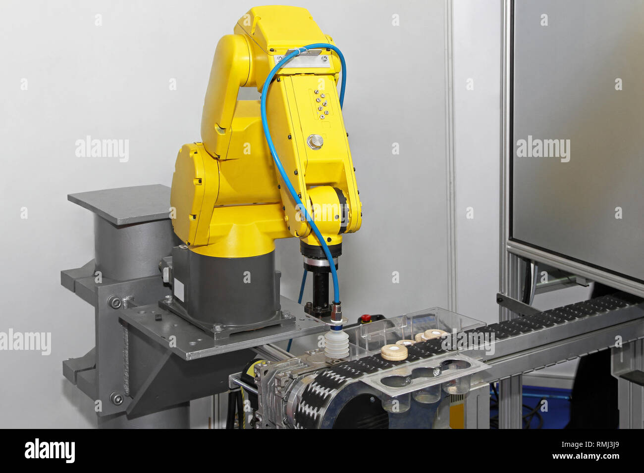 Robotic arm at production line in factory Stock Photo - Alamy