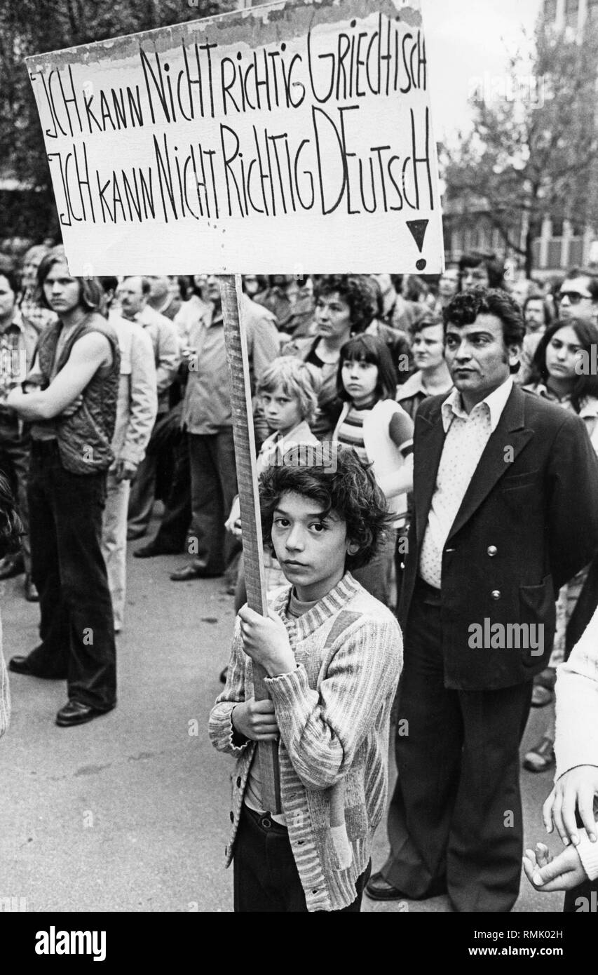 A gastarbeiter child at a demonstration by the GEW (Education and Science Workers' Union) with a sign: 'I don't speak Greek / I don't speak German correctly!'. The GEW calls for a protest against the lack of integration efforts for second-generation foreigners living in Germany. Stock Photo