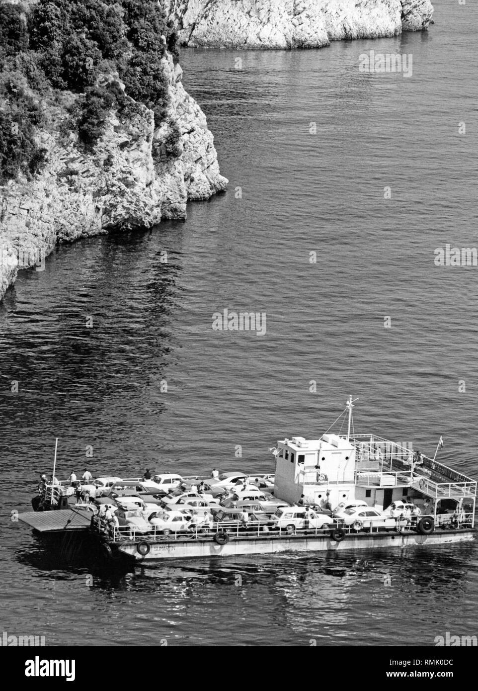 A ferry sails to Cres, the largest island of the Adriatic. Stock Photo