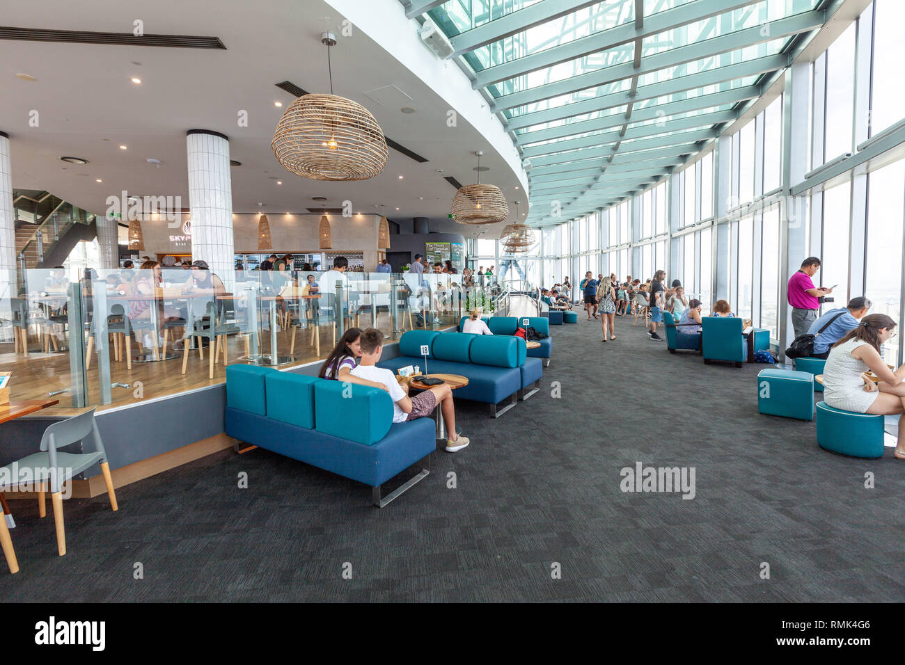 Gold Coast, Australia - January 6, 2019: People enjoying cafe and viewing platform at Skypoint observation desk Stock Photo