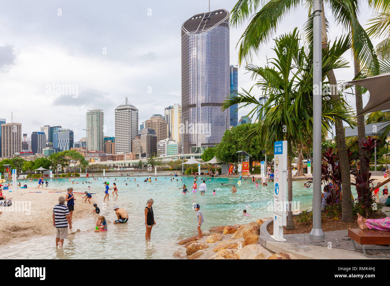 BRISBANE, Australia - January 9 2019: People bathing in Streets Beach inner-city, man-made beach Stock Photo