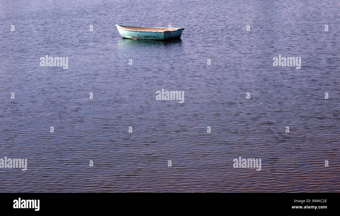 Lone dinghy on the Tamar River, Beauty Point, Tasmania, Australia. No PR Stock Photo