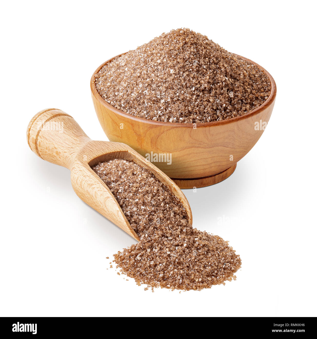 Brown smoked salt in a wooden bowl isolated on white Stock Photo
