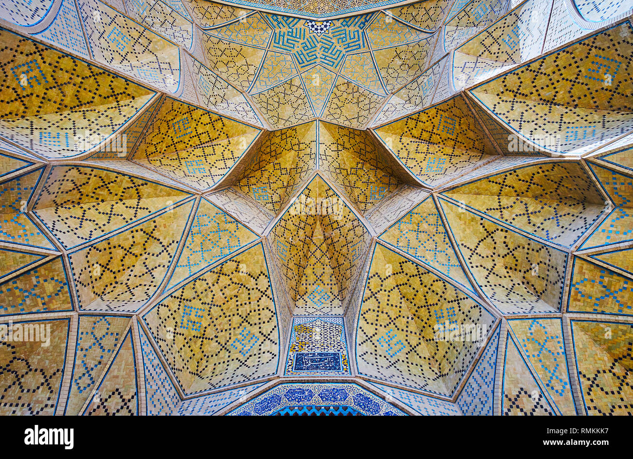 The closeup of the muqarnas arch of the West portal of