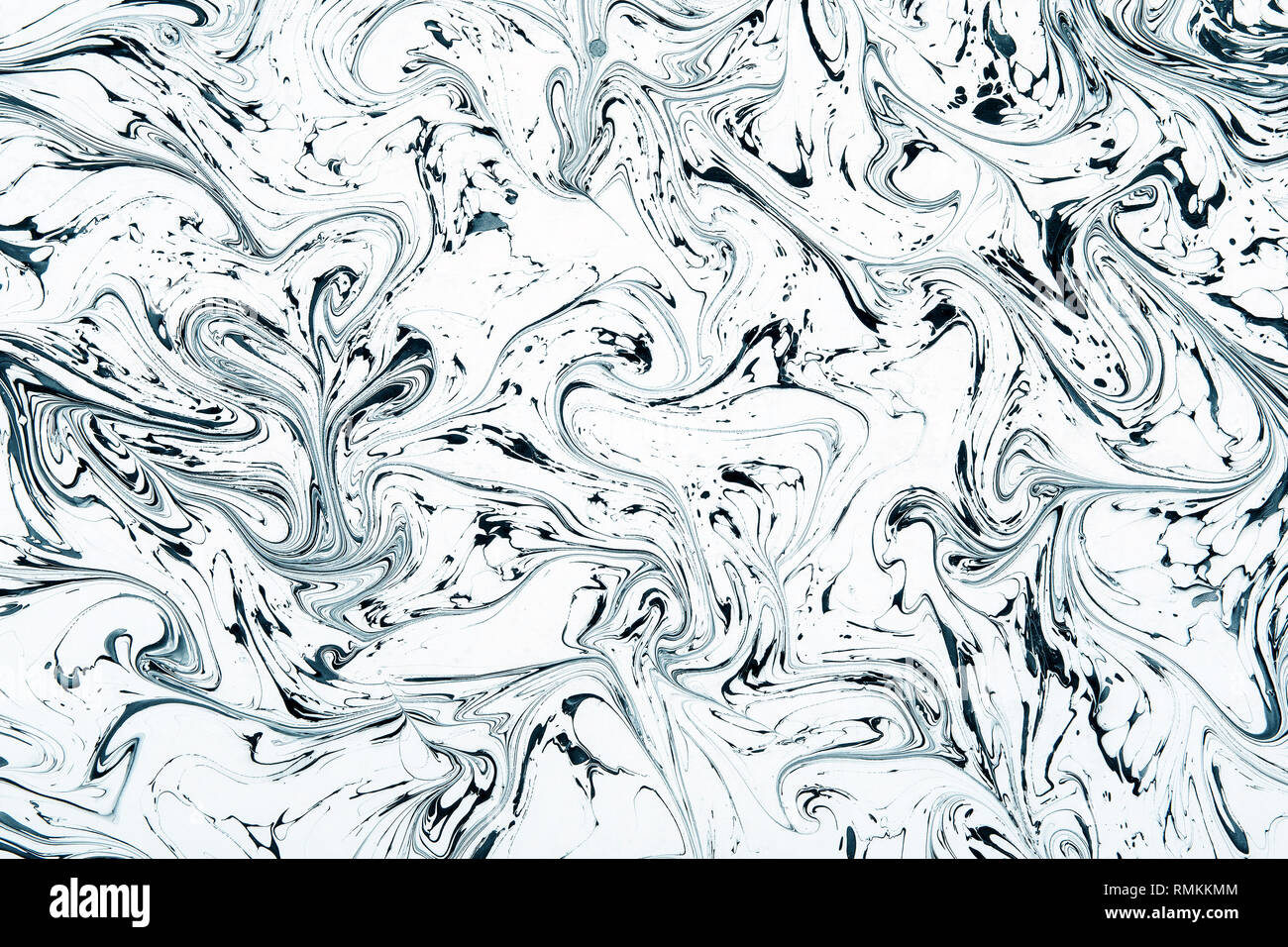 Abstract mixed black and white liquid or acrylic paint. Background concept  with high contrast in close-up and full frame Stock Photo - Alamy