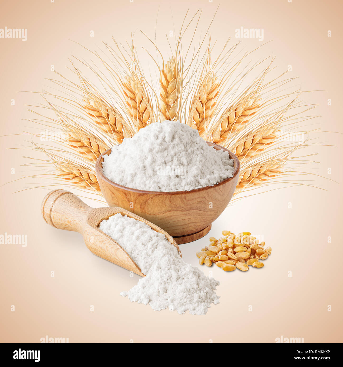 Bowl of white wheat flour and ears isolated Stock Photo