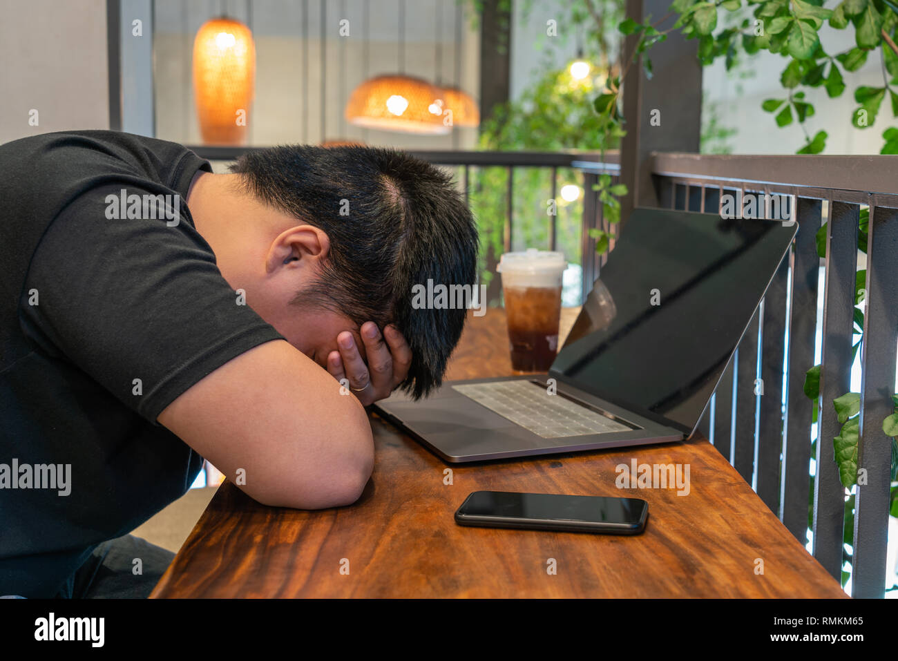 Male student sleeping computer hi-res stock photography and images - Alamy
