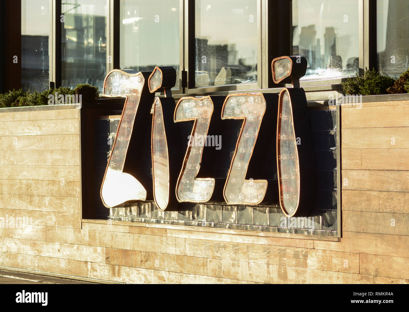 Signage outside Italian restaurant chain Zizzi in Westfield London, White City, London, UK Stock Photo
