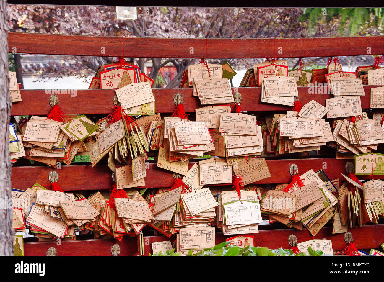 Traditional Chinese Prayer Cards Hang Outside Buddhist Temple Originating In Japan Ema Are Wooden Plaques Inscribed With Wishes Stock Photo Alamy