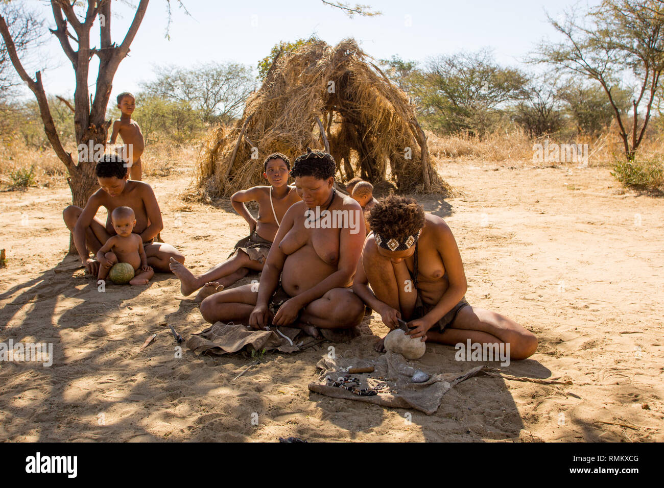 Bushman, Kalahari Desert, Namibia. The Bushmen are indigenous people of southern Africa that span areas of South Africa, Zimbabwe, Lesotho, Mozambique Stock Photo