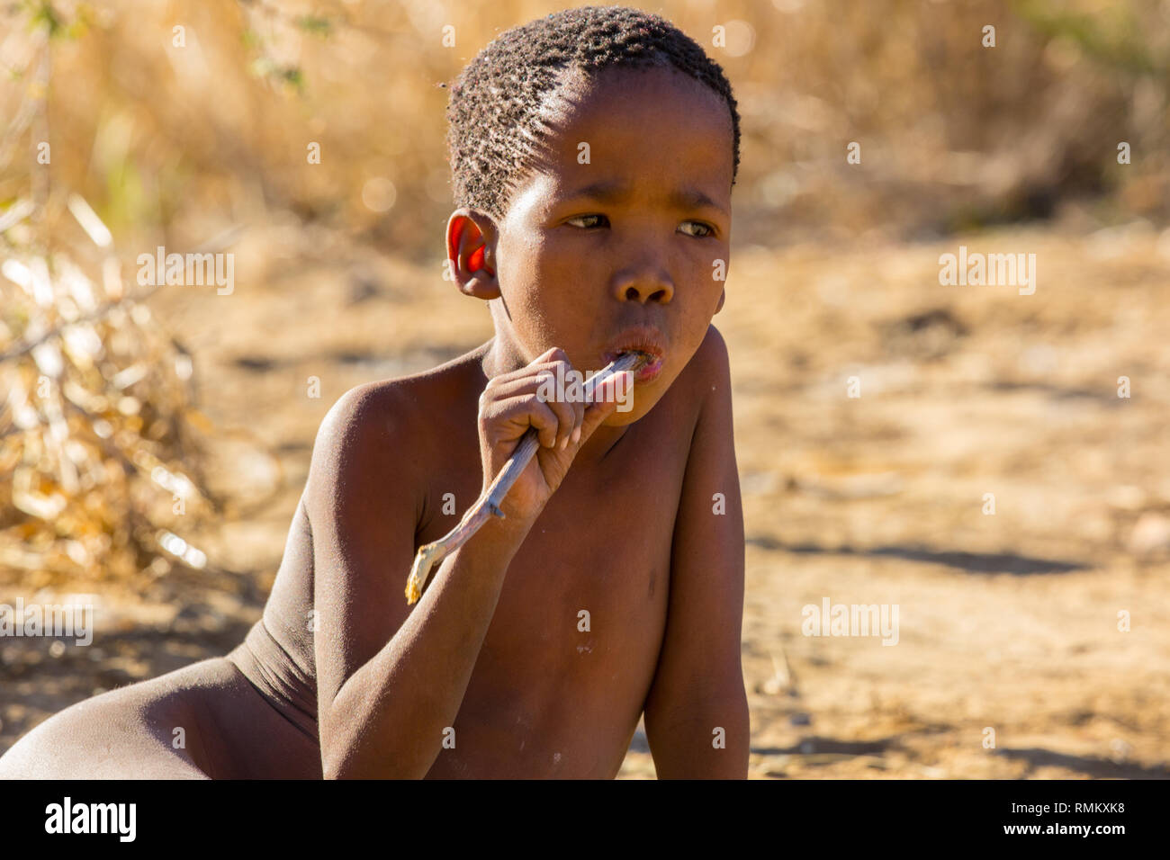 Portrait of a Bushman child. Photographed in Namibia Stock Photo - Alamy