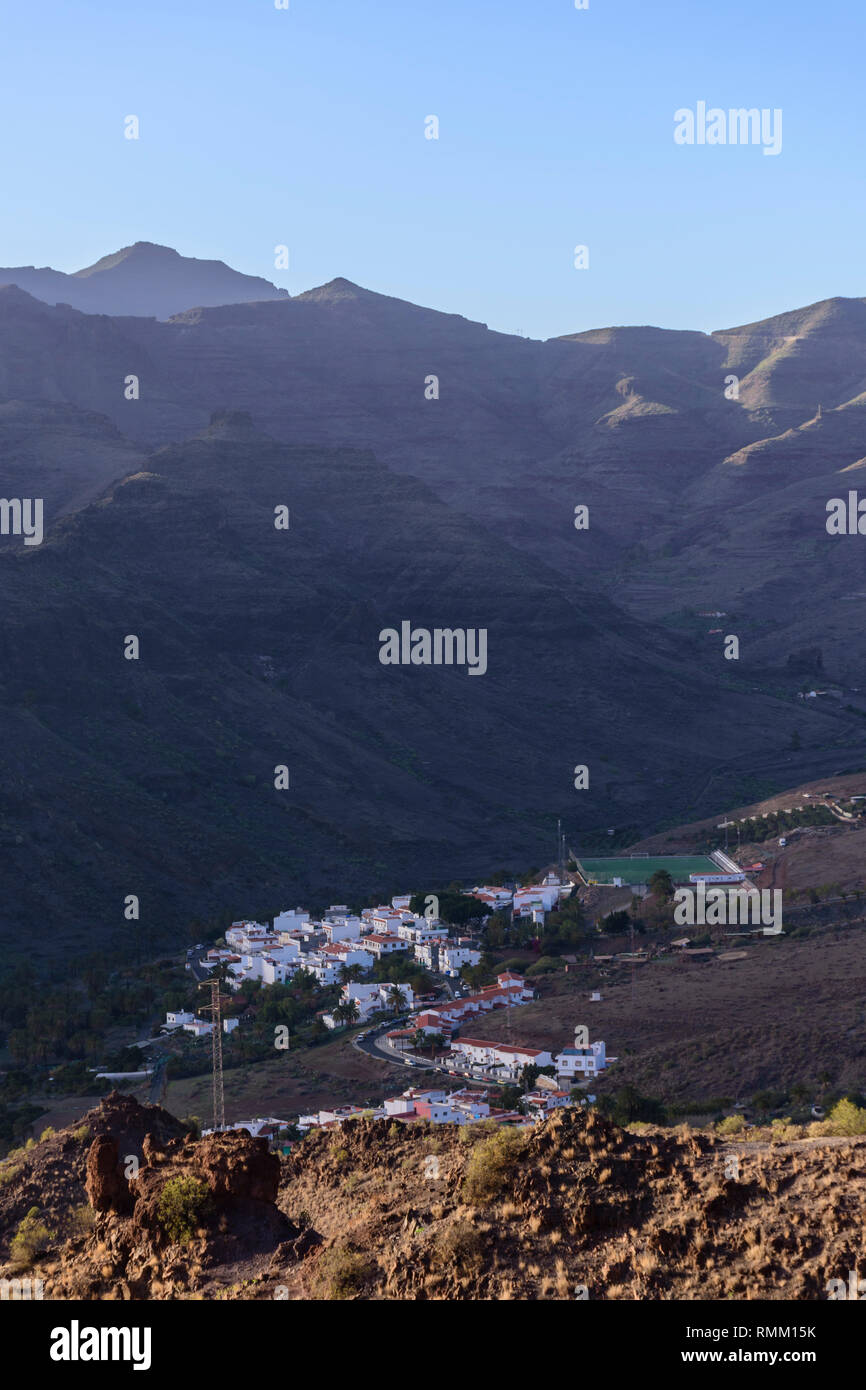 Scene view of village in the valley Stock Photo - Alamy
