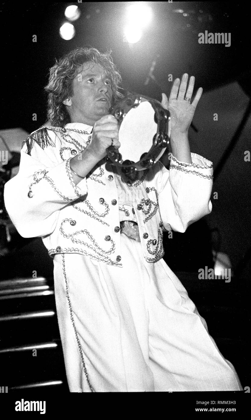 Singer Jon Anderson of Anderson, Bruford, Wakeman & Howe is shown performing on stage during a 'live' concert appearance. Stock Photo