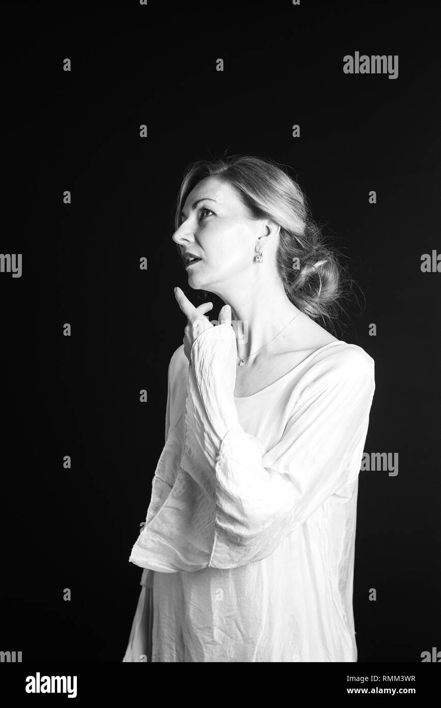 Hand on chin girl serious Black and White Stock Photos & Images - Alamy